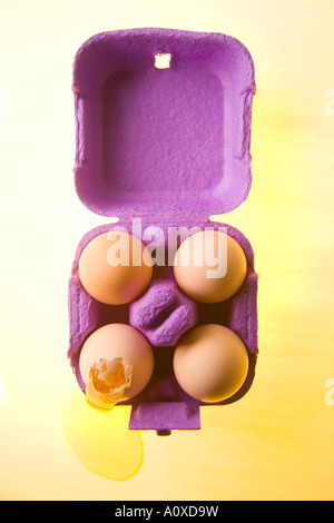 Four eggs in a carton Stock Photo