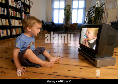 Child watching a video Stock Photo