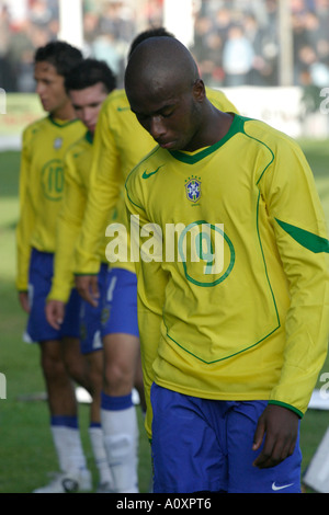 Brazil 9 Fabiano Oliveira looks dejected with team mates during defeat Northern Ireland v Brazil Stock Photo