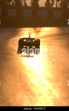 Formula 1 Racecar in backlight Stock Photo