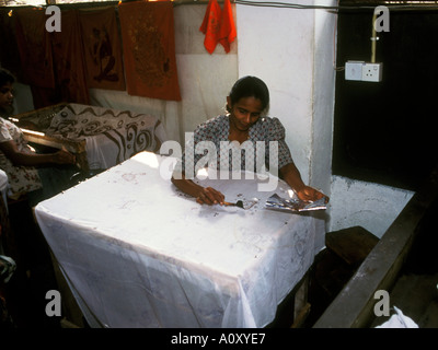 Woman producing Batik hand printed cotton artwork factory in Sri Lanka Stock Photo