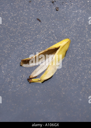 banana peel in pool of water Stock Photo