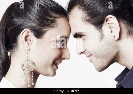 Close-up of a young couple looking at each other Stock Photo