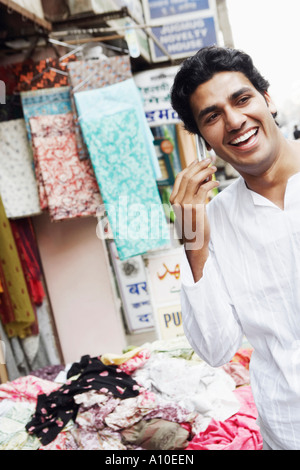 Close-up of a young man talking on a mobile phone Stock Photo