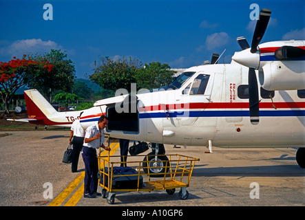 People airplane arriving at Santa Elena International Airport Santa Elena El Peten Department Guatemala Central America Stock Photo