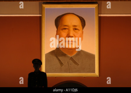 Silhouette of a soldier at the Tiananmen Gate of  Heavenly Peace,  Beijing China, Mao Zedong Portrait Stock Photo