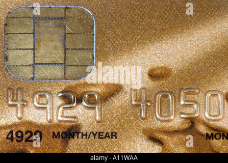 Gold credit card with chip close up Stock Photo