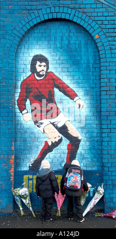 Wall mural celebrating Football legend George Best at Windsor Park football ground Stock Photo