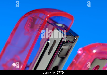 Pink office stapler detail Stock Photo