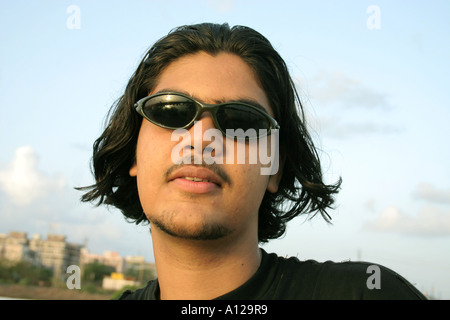 Indian model long hair sunglasses mustache beard Mumbai Maharashtra India - MR#542 Stock Photo