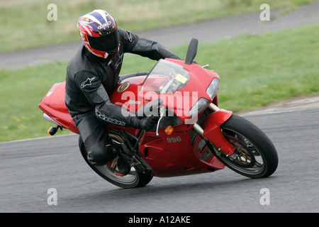 rider on red ducati 996 at kirkistown track day kirkistown circuit county down northern ireland Stock Photo