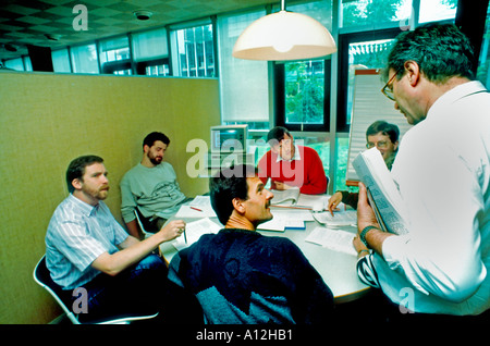 Medium Crowd, Education Young Adult Men Working Together in University Lab INSEAD Business School, Businessman MBA, international people in meeting Stock Photo