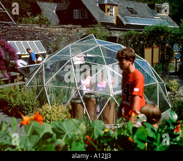 Visitors in the vegetable garden in the grounds of the Centre for Alternative Technology at  Machynlleth in Powys Wales UK Great Britain KATHY DEWITT Stock Photo