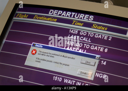 Old Windows error message tells Newcastle UK air travellers in 2006 the announcement system has crashed Stock Photo