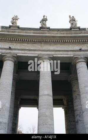 Columns and statues in St Peters Square Berninis Square Piazza Saint Pietro Vatican City Rome Italy Stock Photo