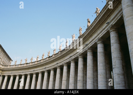 Columns and statues in St Peters Square Berninis Square Piazza Saint Pietro Vatican City Rome Italy Stock Photo