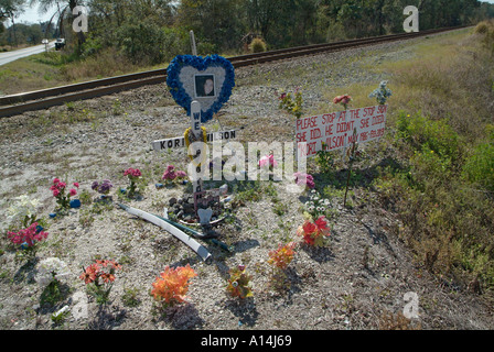 Roadside memorial for a young woman killed by a drunk driver who ran a stop sign Stock Photo