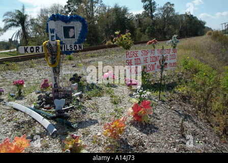 Roadside memorial for a young woman killed by a drunk driver who ran a stop sign Stock Photo