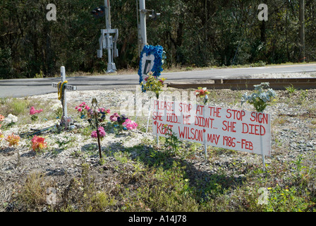 Roadside memorial for a young woman killed by a drunk driver who ran a stop sign Stock Photo