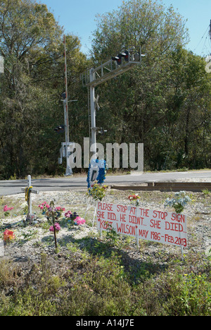 Roadside memorial for a young woman killed by a drunk driver who ran a stop sign Stock Photo