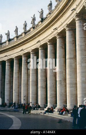 People at St Peters Square Colonnade Berninis Square Vatican City Rome Italy Stock Photo