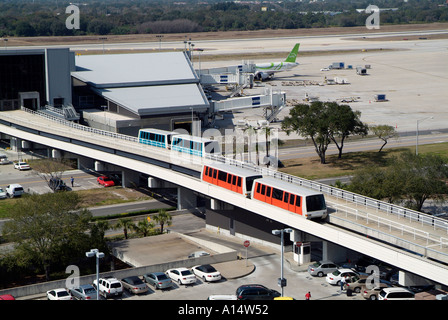 Monorail system transports passengers between main terminal and aircraft boarding area at Tampa International Airport Florida Stock Photo