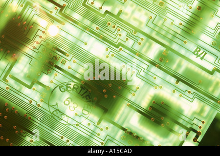 Computer chips and components on computer hard disk circuit board printed circuit and solderd connections Stock Photo