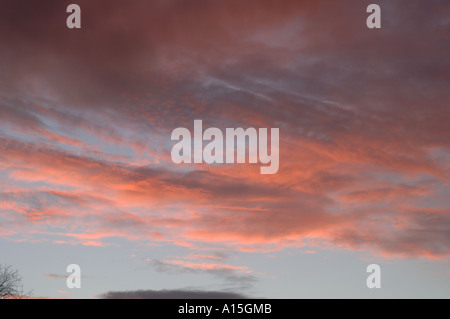 Spectacular sunset with subtle red purple and blue sky colour November Devon Stock Photo