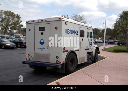 Brinks Armored Truck picks up and delivers cash money to banks and