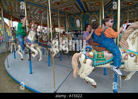 Florida State Fair at Tampa Florida offers entertainment food eating daring rides and fun for families Stock Photo