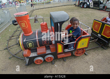 Florida State Fair at Tampa Florida offers entertainment food eating daring rides and fun for families Stock Photo