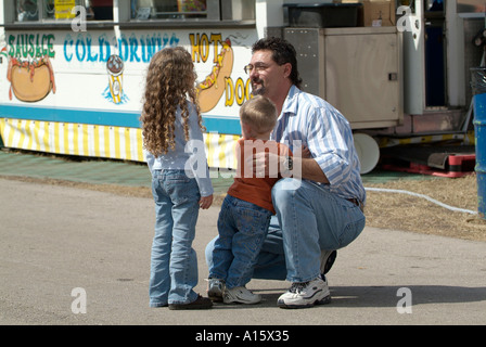 Florida State Fair at Tampa Florida offers entertainment food eating daring rides and fun for families Stock Photo