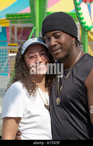 Black couple pose for picture at the Florida State Fair Tampa Stock Photo