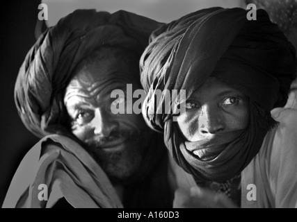 Islamic men in the village of Bounessa in the Affole region of Mauritania gather to drink tea. Bounessa is a village of only 61 Stock Photo