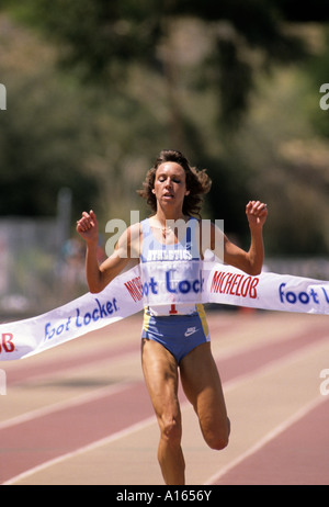 Digital stock image of Mary Decker Slaney running in track meet Stock Photo