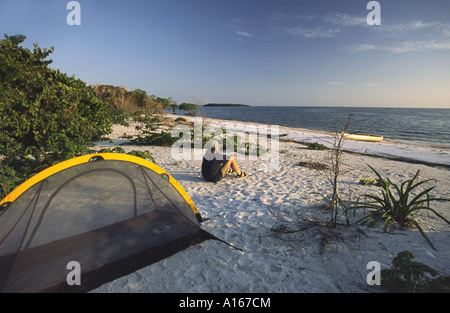 Canoeist camping on beach at Picnic Key in Ten Thousand Islands area in Everglades National Park, Florida, USA Stock Photo