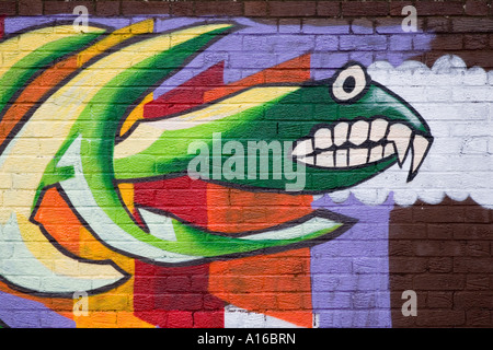 Graffiti school wall painting Dundee City brick Legal Wall, Tayside Scotland UK Stock Photo