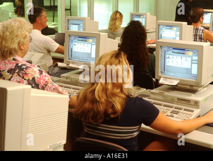 College Students in computer lab learning computers Stock Photo