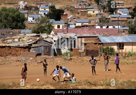 Alexandra Township Johannesburg South Africa play football soccer ball player team Stock Photo