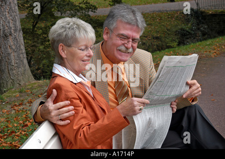 Pair of senior citizens in the park Stock Photo