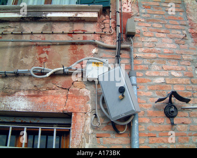 power supply line on the wall Stock Photo
