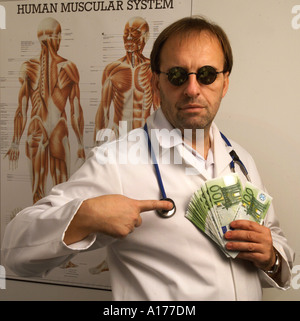 Physician with euro notes symbol picture Stock Photo