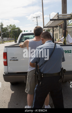 Police officer frisking suspect. Kansas City, MO, PD, USA. Gang Squad ...