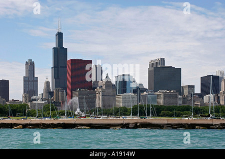 Chicago skyline from the water including Sears Tower and Buckinham fountain. Stock Photo