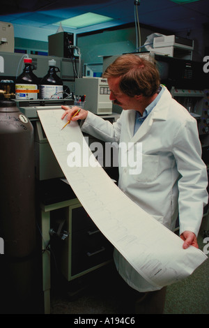 bio engineer examining data CA Stock Photo