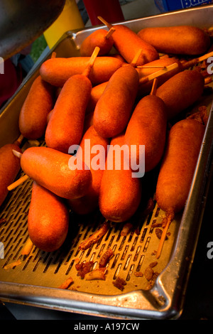 Classic Pronto Pups deep fried wheat covered hot dogs. Grand Old Day St Paul Minnesota USA Stock Photo