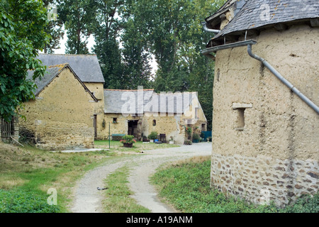 Houses built with rammed earth, 'Le Bas Caharel' hamlet, Saint-Juvat, Brittany, France Europe Stock Photo