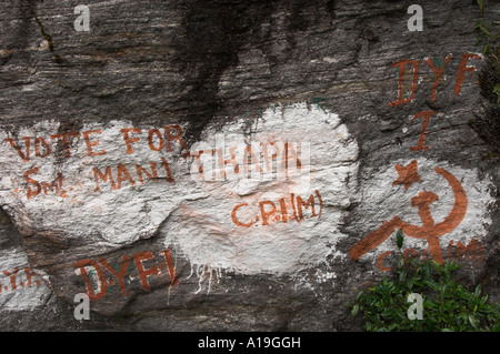India West Bengal Himalaya range Darjeeling area Singalila trek village of Ramam graffiti on rock face for maoist political part Stock Photo