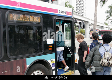 Miami Florida,Omni Bus Station,Miami Dade Metrobus,passenger passengers rider riders,boarding,Haulover Beach,FL061124009 Stock Photo