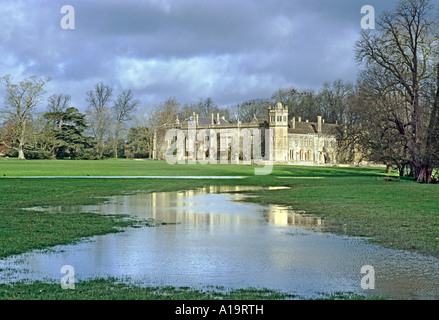 Lacock Abbey near Chippenham Wiltshire England UK EU. Winter flood water viewed from the public highway Stock Photo